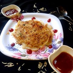A picture of Stuffed veg noodles dosa (chinese dosa).