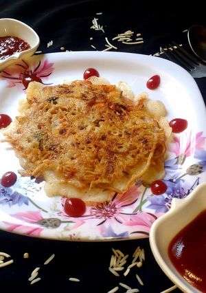 A picture of Stuffed veg noodles dosa (chinese dosa).