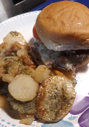 A picture of Smashedcheeseburger and German Fried Potatoes.