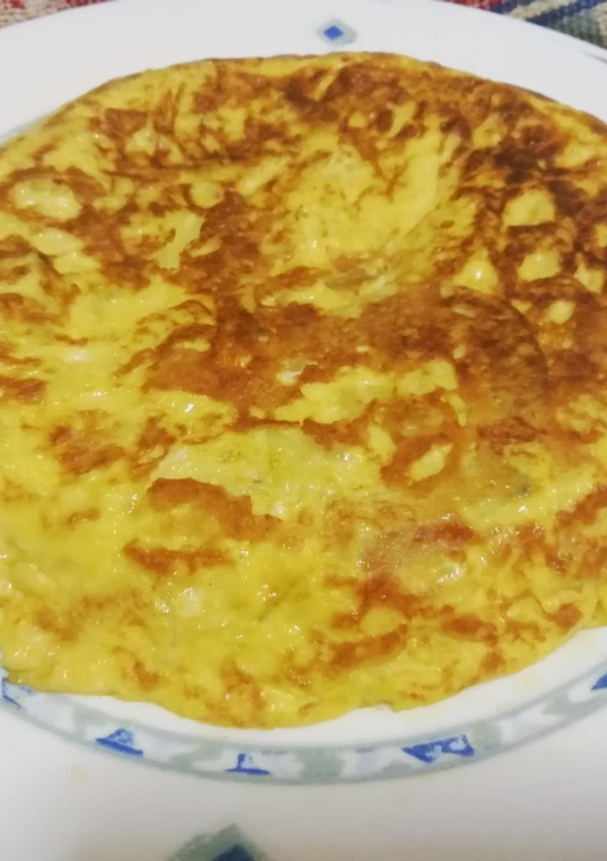 Una foto de Tortilla de calabacín, cebolla y huevo