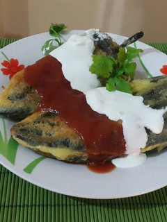 Una foto de Chiles poblanos rellenos de queso