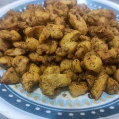 A picture of Chicken Tikka chunks.