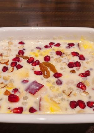 A picture of Sabudana Kheer with Pomegranate, Apple and Nuts.