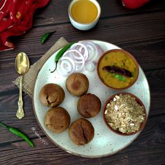 A picture of Rajasthani Dal-stuffed Bati Churma.