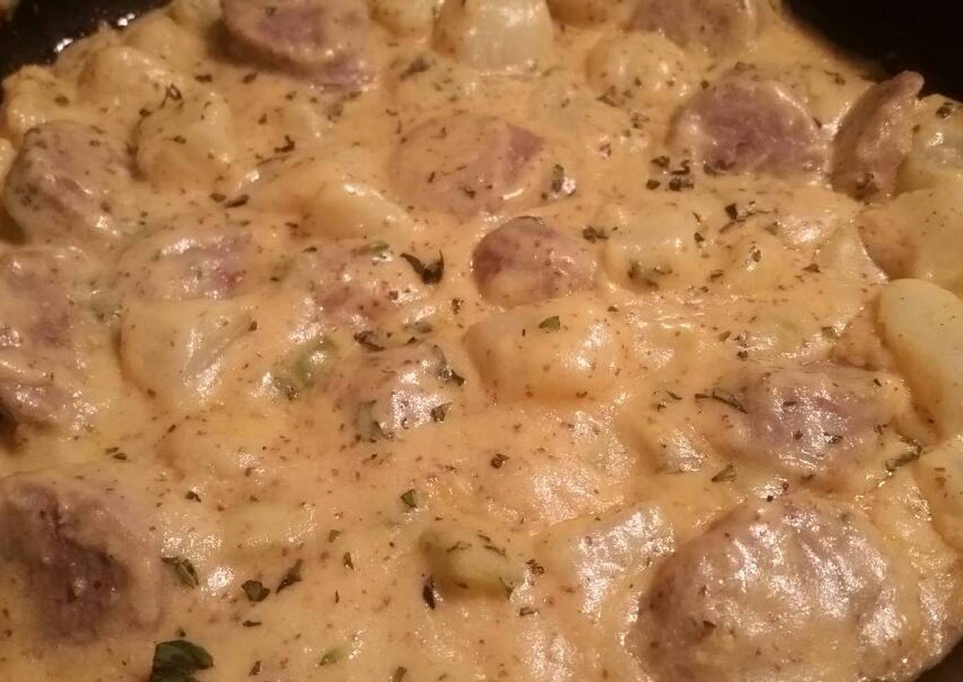 Sausages and fries with beer sauce