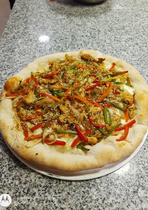 Una foto de Chop suey a la pizza con masa integral