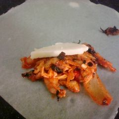 Spicy chicken cheese burst spring roll A picture of Spicy chicken cheese burst spring roll.