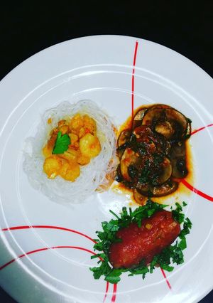 A picture of Shrimps in red sauce.