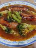 Chorizos al dulce de miel con brócoli