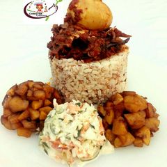 A picture of Ofada rice with stew,dodo and coleslaw.
