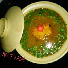 A picture of Besan ki tikki ki sabzi.