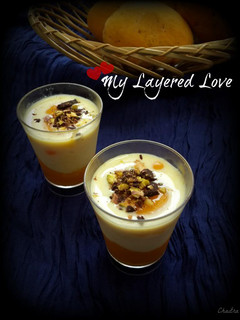 A picture of Mango-Vanilla Custard Verrines with Nuts & Dark Chocolate.