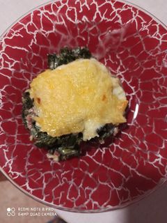 Una foto de Espinacas gratinadas con jamón y queso