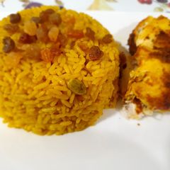 A picture of Roasted chicken with rice.