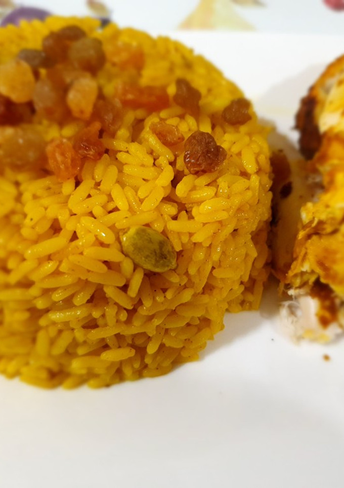 A picture of Roasted chicken with rice.