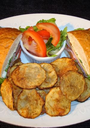 A picture of Ham, Munster Cheese, and Smoked Bacon Sandwich – Jon Style.