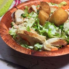 A picture of Chicken Caesar salad.