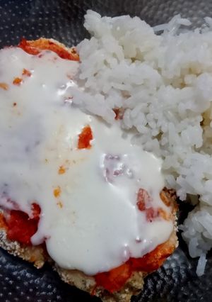 Una foto de Suprema napolitana con arroz