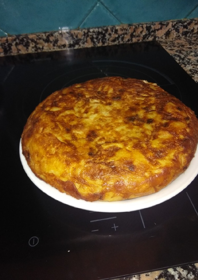 Una foto de Tortilla de patatas y cebollas