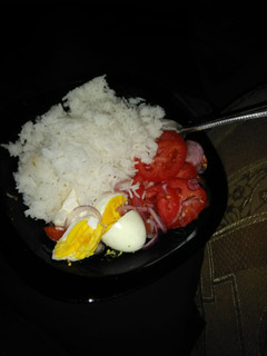 A picture of Plain rice with boiled eggs#authormarathon#.
