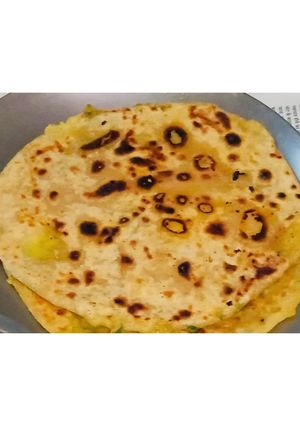 A picture of Tasty 😋aloo Paratha from North India 🥔.
