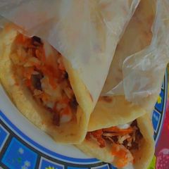 A picture of Chicken tikka Shawarma.