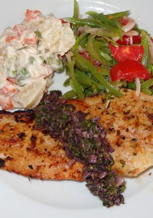 A picture of Grilled Chicken Breast with Chimichurri Tapenade.