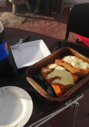 Una foto de Calabacín relleno de carne cebolla y morrón