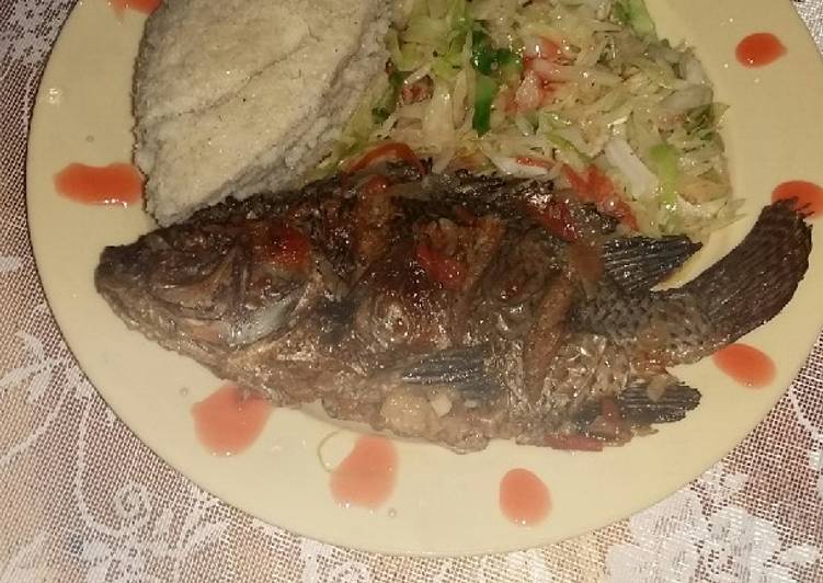 Garlic wet fried fish and ugali