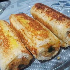 A picture of Bread potatoe spinach roll.