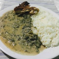 A picture of Pumpkin leaves with coconut milk.