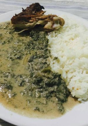 A picture of Pumpkin leaves with coconut milk.