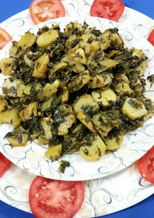 A picture of Aalu methi with dry spices.