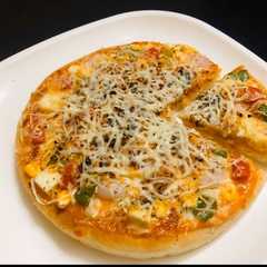 A picture of Mayonnaise Paneer Cheese Pizza.