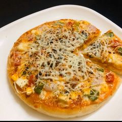 A picture of Mayonnaise Paneer Cheese Pizza.