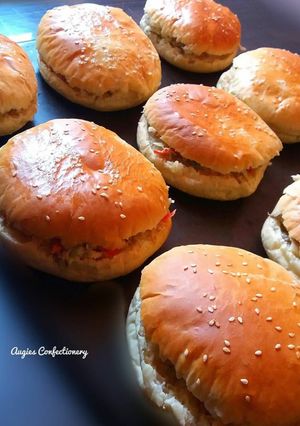 A picture of Burger with shredded beef and cabbage.