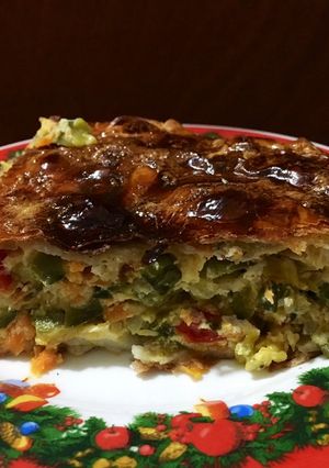 Una foto de Torta de zapallitos rápida (con masa comprada) 🥧🥕🫑🧅