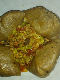 A picture of Moimoi with chicken_ cabbage sauce.