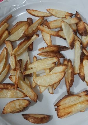 Una foto de Papas fritas en freidora de aire