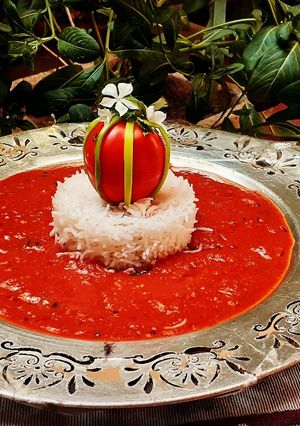 A picture of Hydrabadi Tomato kutt with boiled rice🍅.