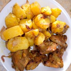 A picture of Oven grilled potatoes and chicken.