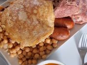 Una foto de olla express garbanzos chorizo panceta