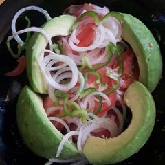 A picture of Kachumbari with avocado.