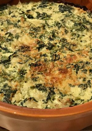 Una foto de Pastel de merluza, espinaca y queso