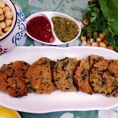 A picture of Falafel with spinach.