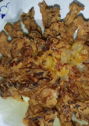 Una foto de Blooming onion (cebolla frita)