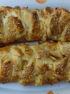 Una foto de Trenza de hojaldre de pavo y queso