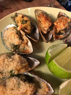 Una foto de Mejillones Parmesanos