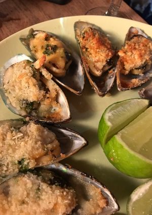 Una foto de Mejillones Parmesanos