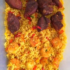 A picture of Shrimp stirred fried rice and fried beef.